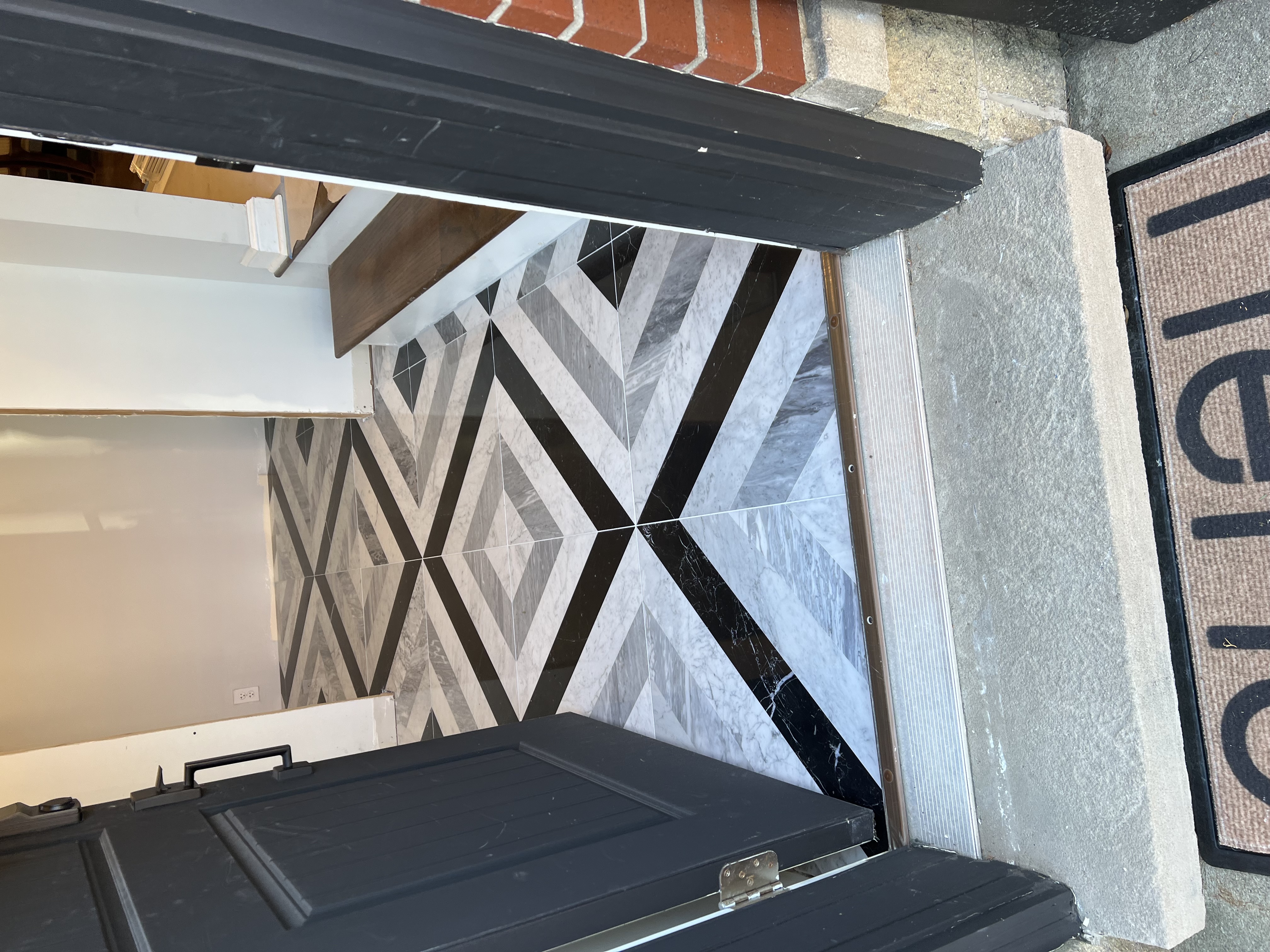 Remodeling project door with tile